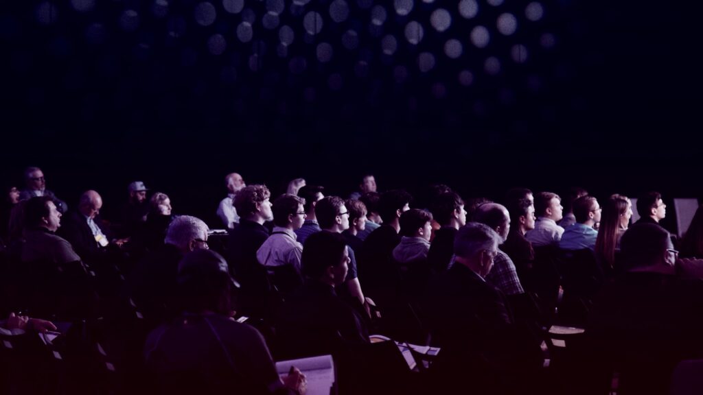 People attending a scientific conference